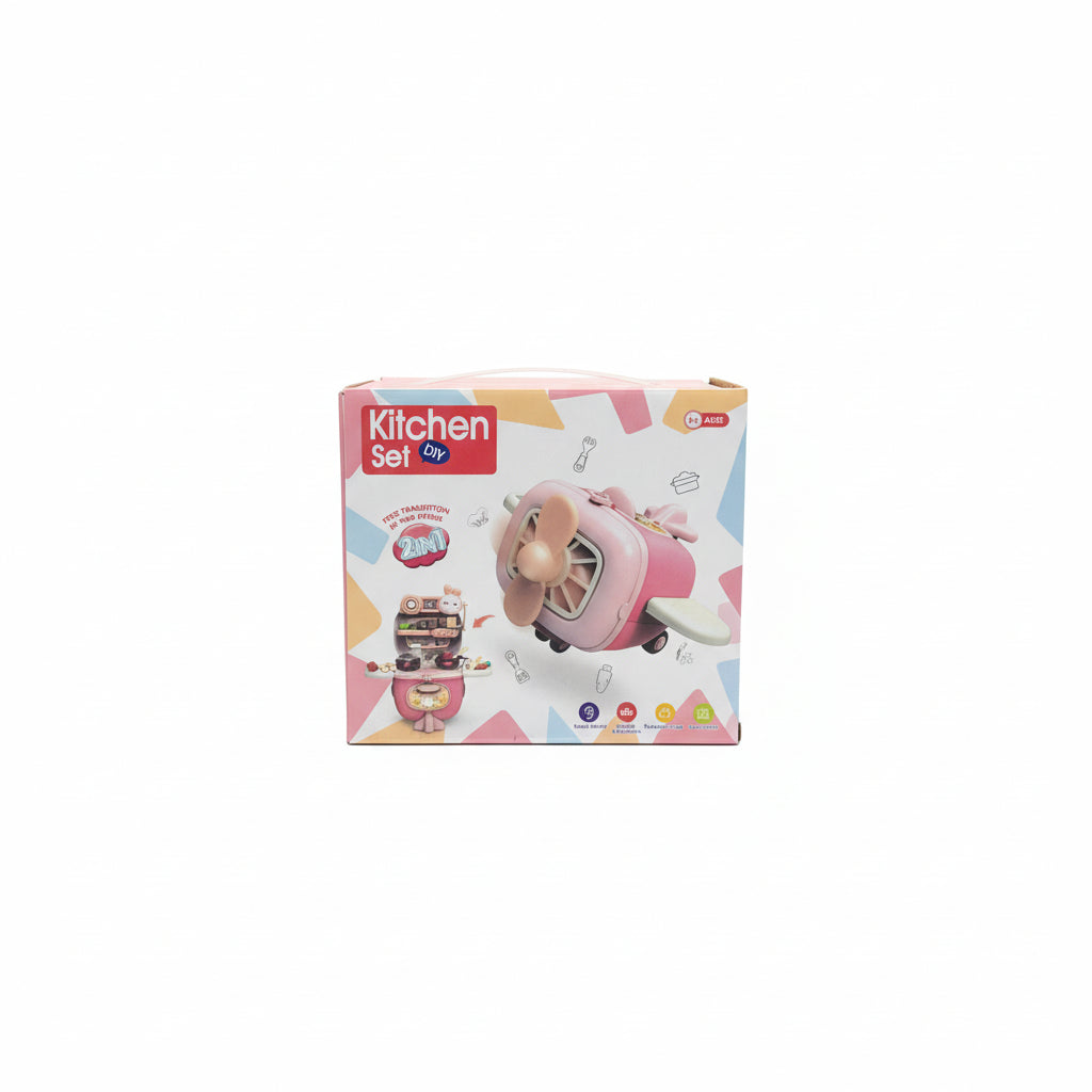 Toy kitchen set packaging on a white surface with a plant in the background